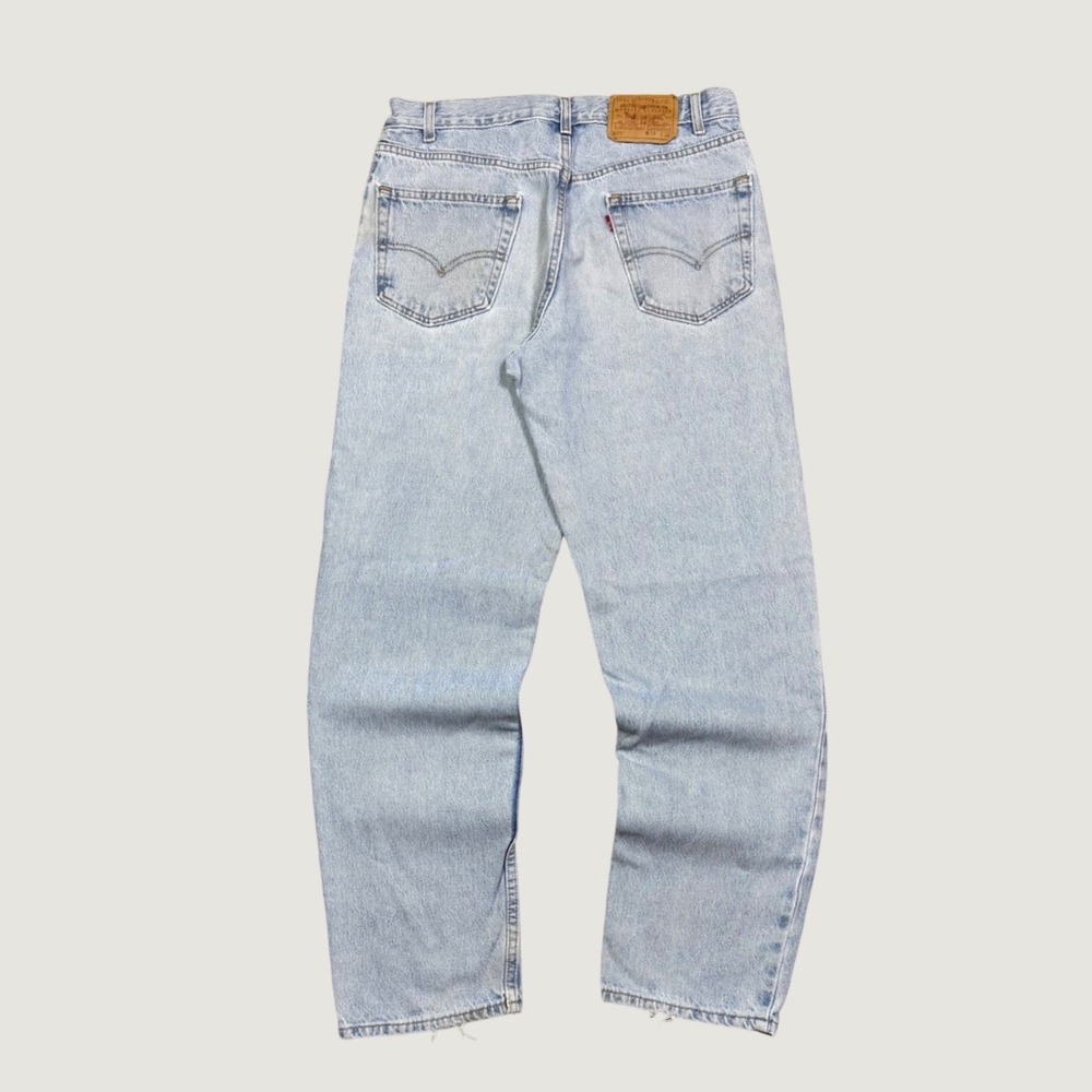 Vintage Levis 550 Relaxed Fit Tapered Light Wash Jeans Made in USA 34x32